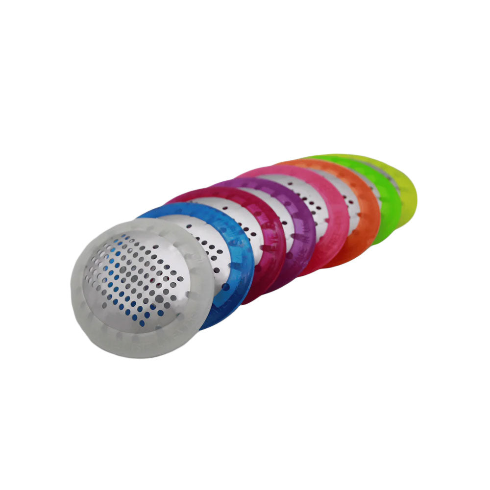 A row of colorful tea infusers with perforated metal tops and silicone bases aligns at an angle, resembling the vibrant hues of a MedPharma USA Fox Aluminum Eye Shield, available in silver, blue, purple, orange, red, and green.