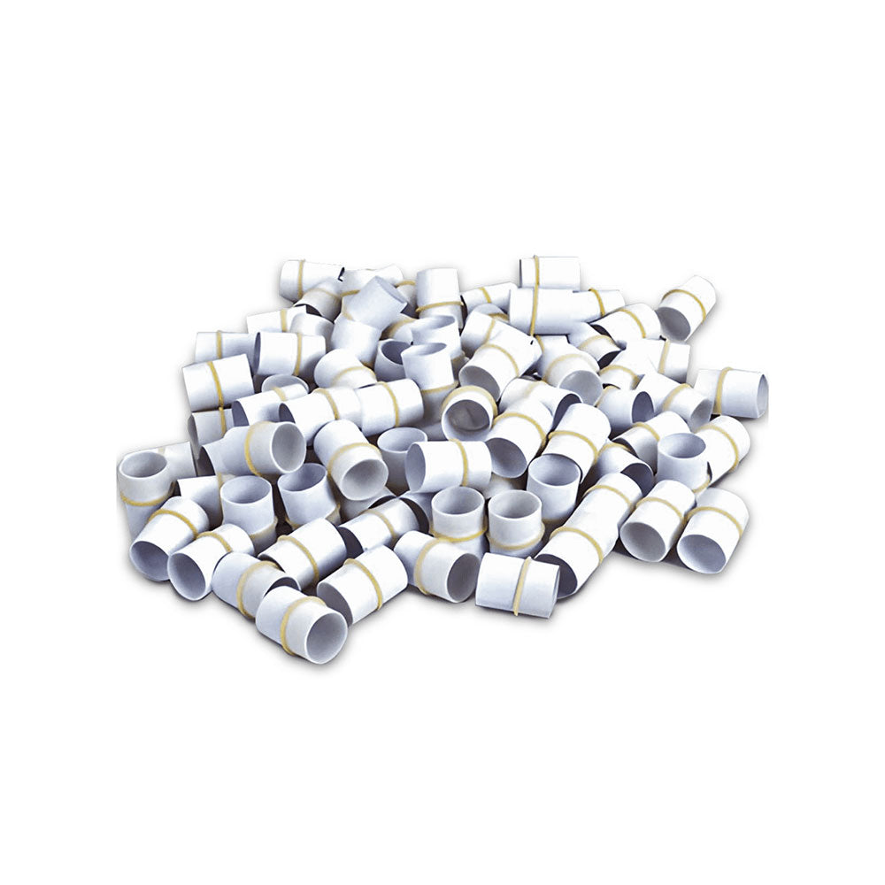 MedPharma USAs tonometer tip covers, small white cylinders with gold bands, are scattered on a white surface. Theyre individually wrapped for optimal hygiene and come in a box of 200.
