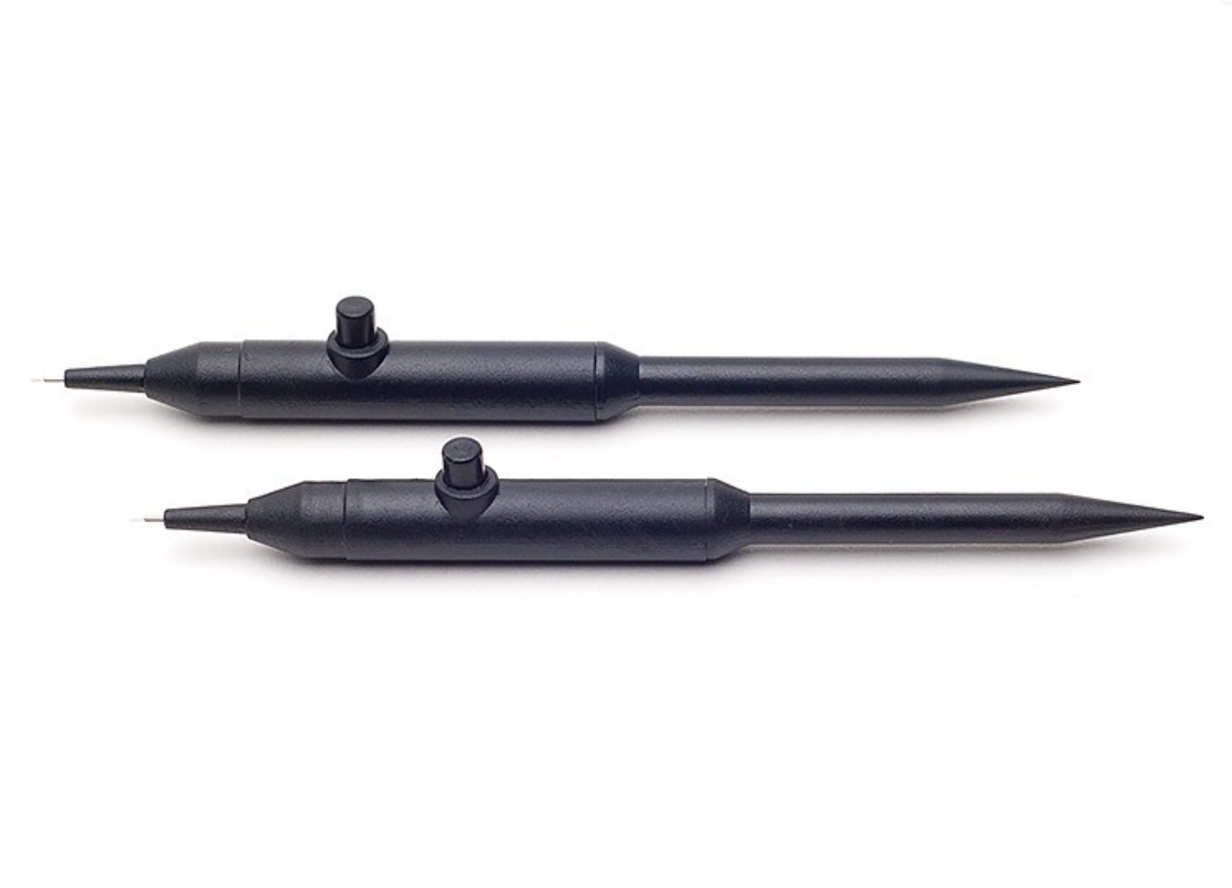 Two Lacrivera VeraPlug FlexFit sterile punctal occluders, with cylindrical shapes and precise silicone grips for comfort, rest parallel on a white background.